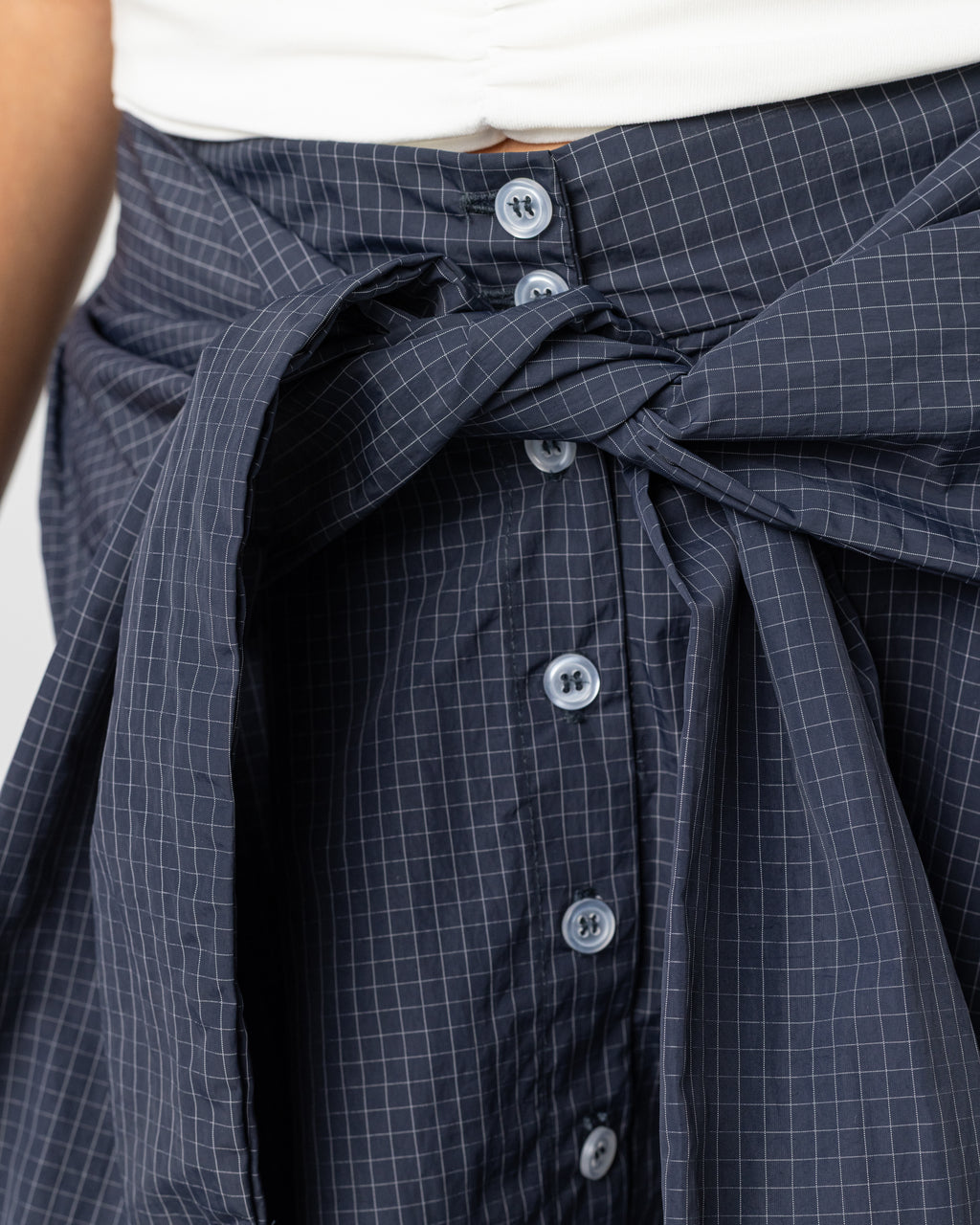 Chequered wraparound skirt in navy blue
