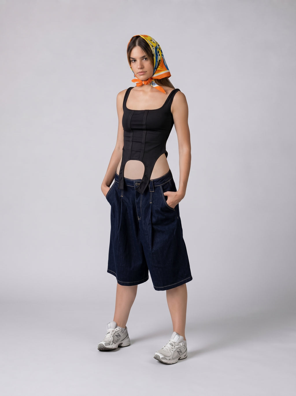 Asymmetrical hem tank top in Black