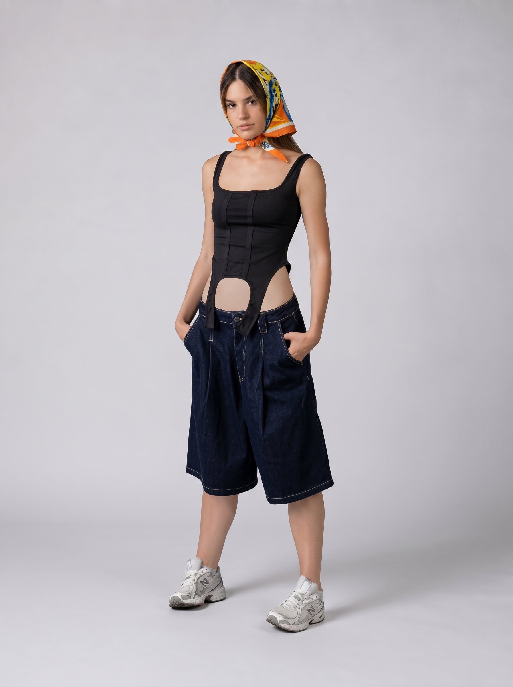 Asymmetrical hem tank top in Black