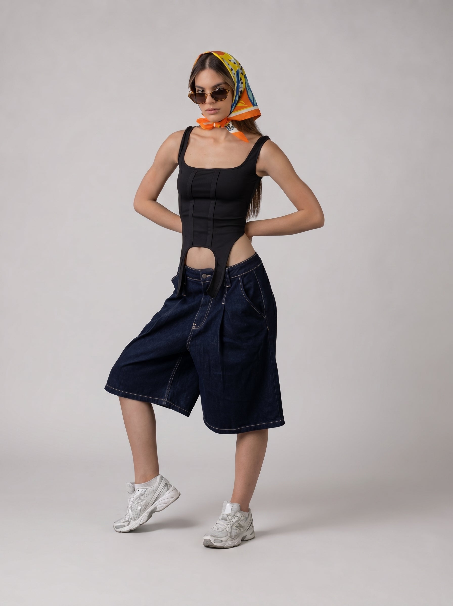 Asymmetrical hem tank top in Black
