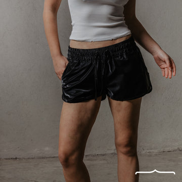 Metallic low rise shorts in Black