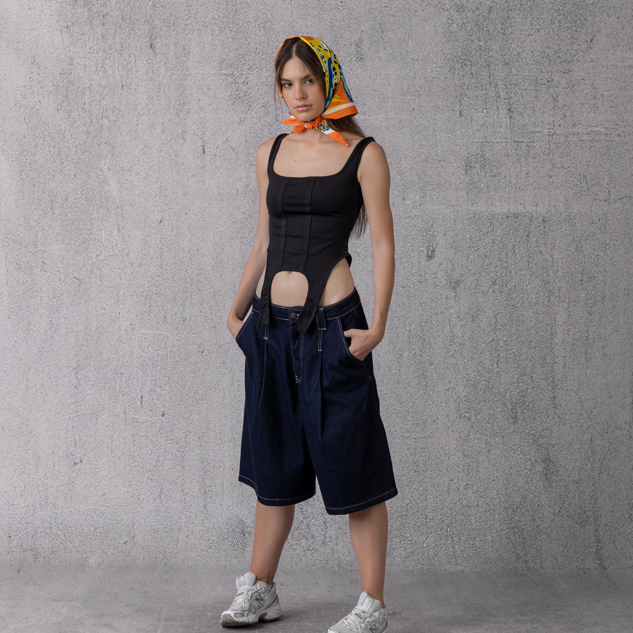 Asymmetrical hem tank top in Black