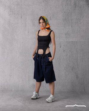 Asymmetrical hem tank top in Black