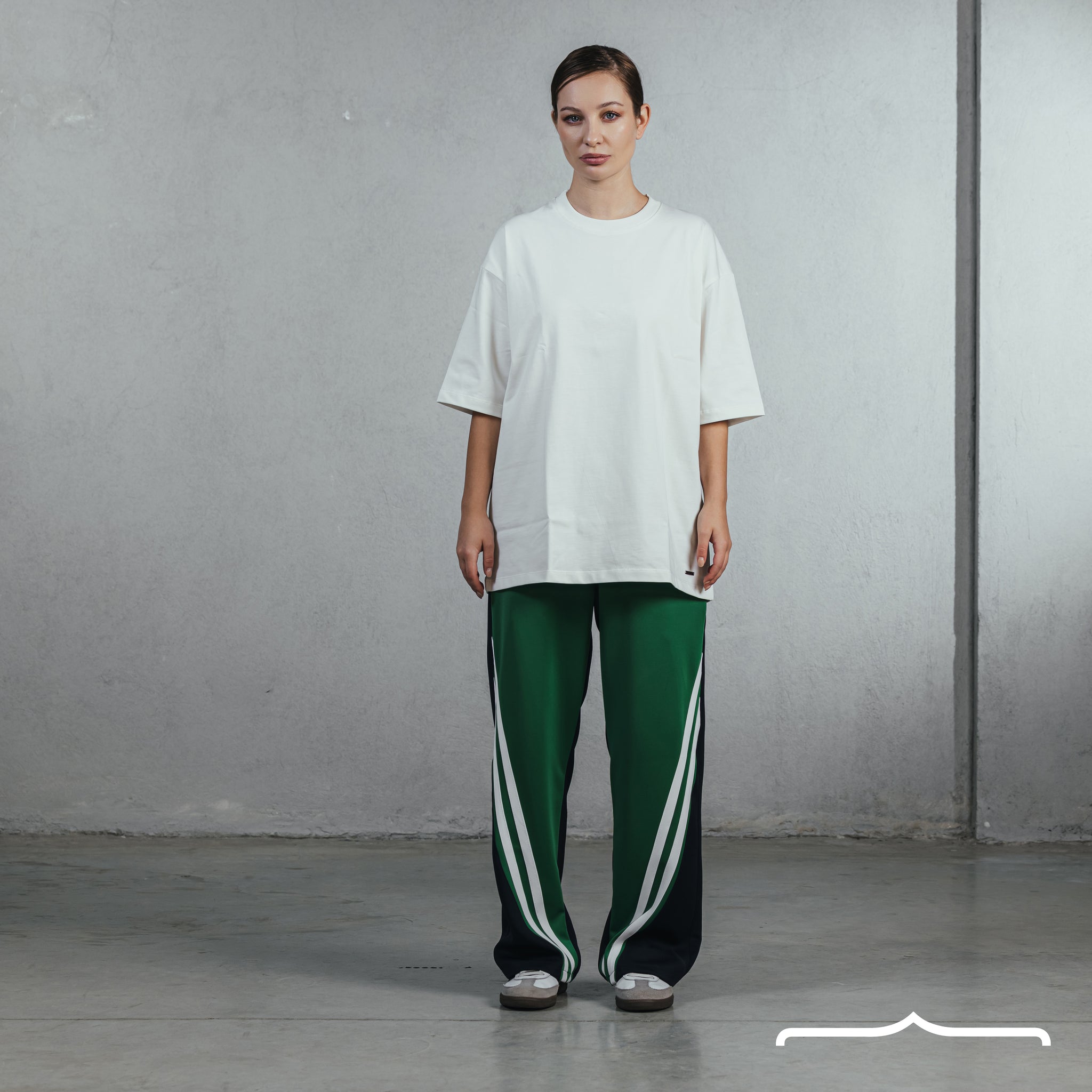Striped track pants in Green